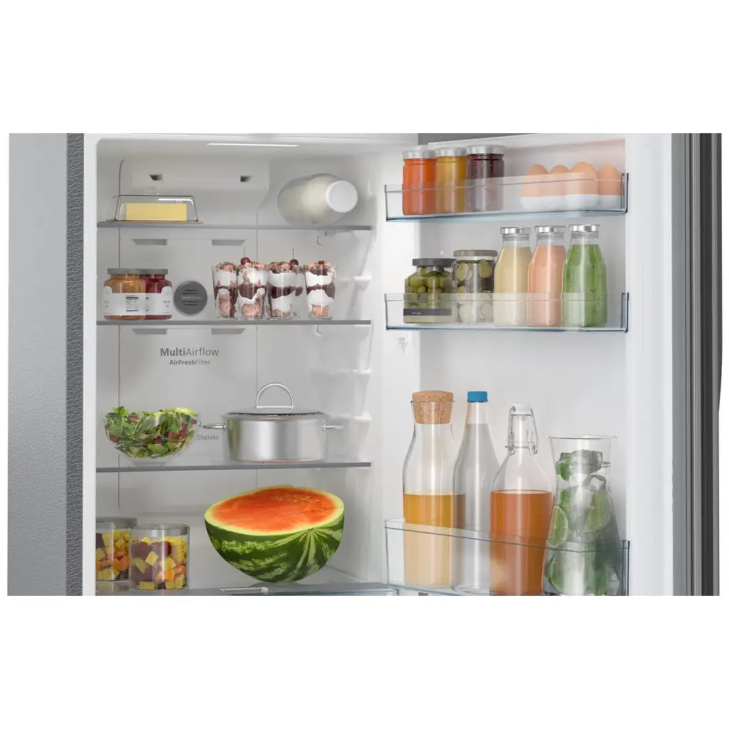 Open Bosch refrigerator CTC27K031I with various food items inside, including a watermelon.